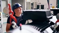 assembler working on a pump