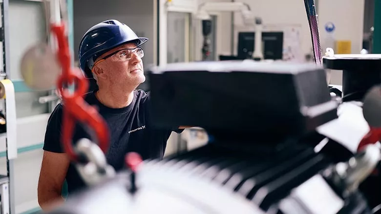 assembler working on a pump
