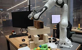 cobot assembling wood blocks