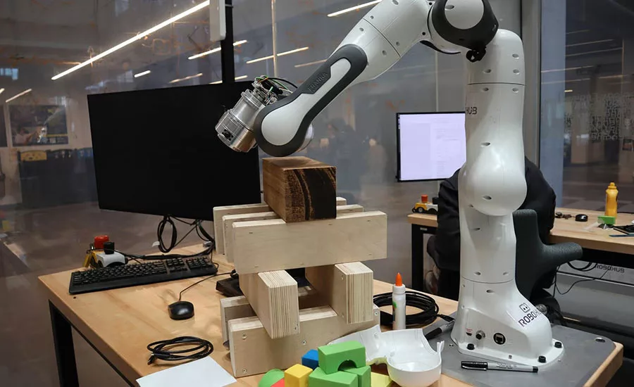 cobot assembling wood blocks