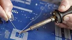 soldering a component onto a circuit board