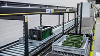 material handling system with two tiers for goods coming in and goods going out
