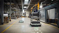 KMP 1500P AMRs bring parts and supplies to a welding cell KMP 1500P AMRs bring parts and supplies to a welding cell
