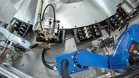 a SCARA robot picks and places parts