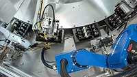a SCARA robot picks and places parts