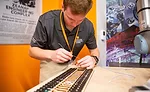 engineer aligning a wire termination