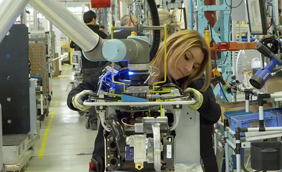 operator working with a collaborative robot