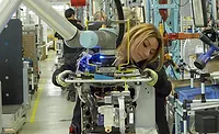 operator working with a collaborative robot