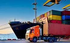 boat loaded with shipping containers