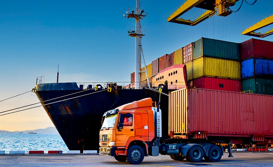 boat loaded with shipping containers