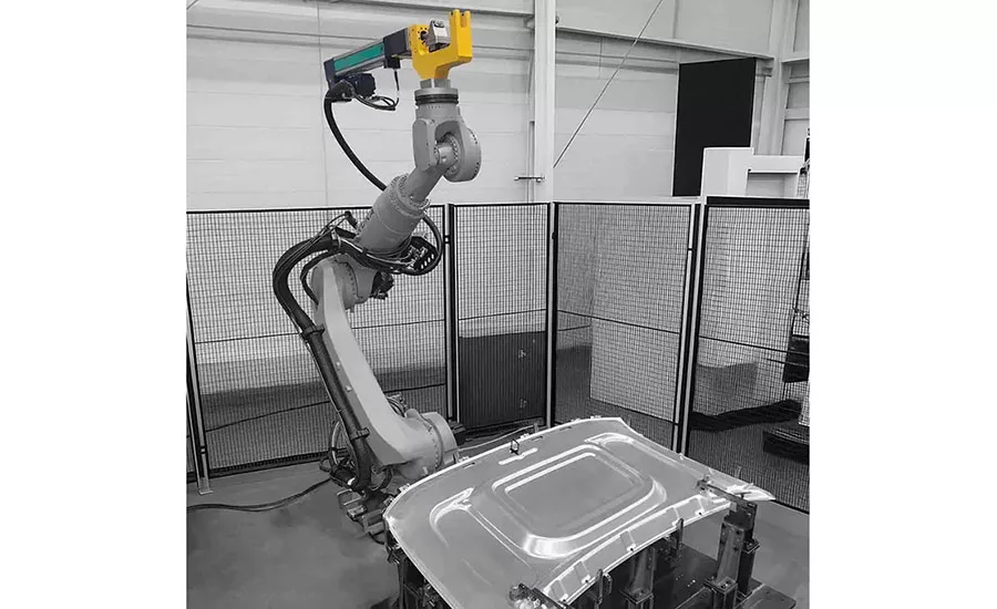 staking tongs mounted to a robot