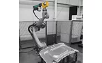 staking tongs mounted to a robot