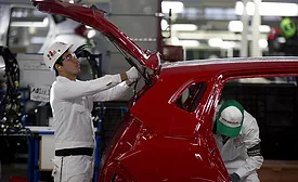 workers at a Honda assembly plant